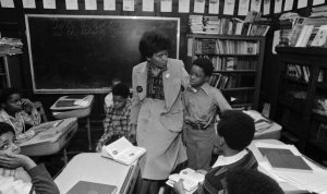 Photograph of Marva Collins teaching in a 1970s classroom, representing grassroots educational reform and belief in every student’s potential.